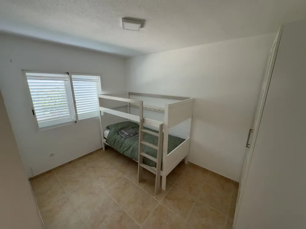 Children's bedroom with bunk beds, ideal for families