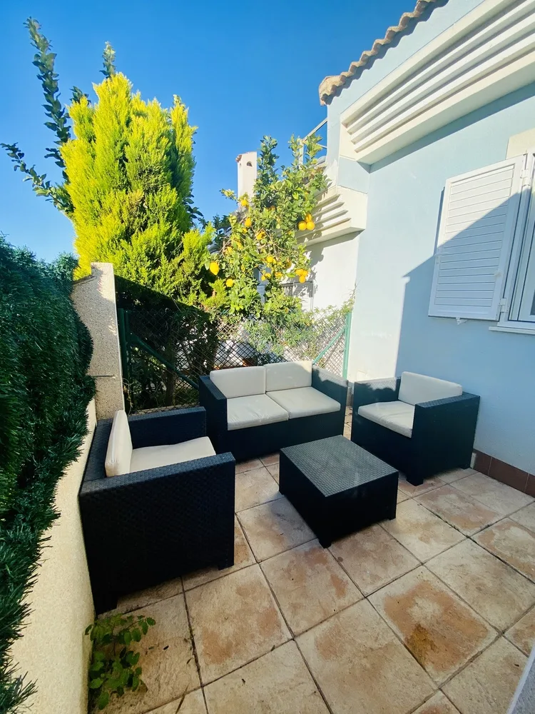 Terrace with rattan chill-out lounge at the Montefaro holiday home